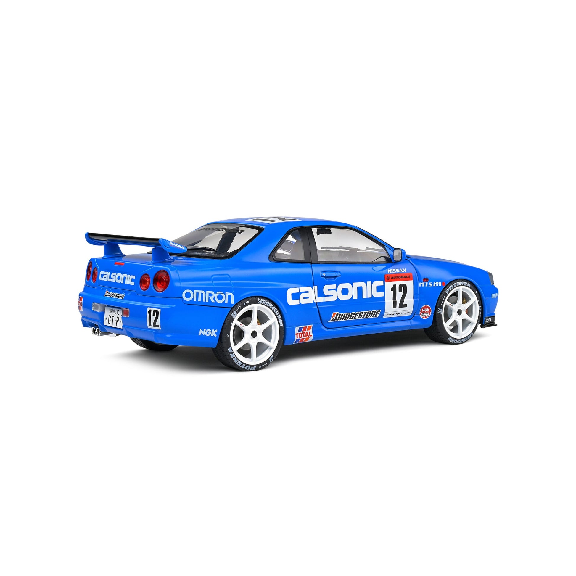 Nissan GT-R R34 #12 Calsonic Bleue Solido 1/18 - S1804307