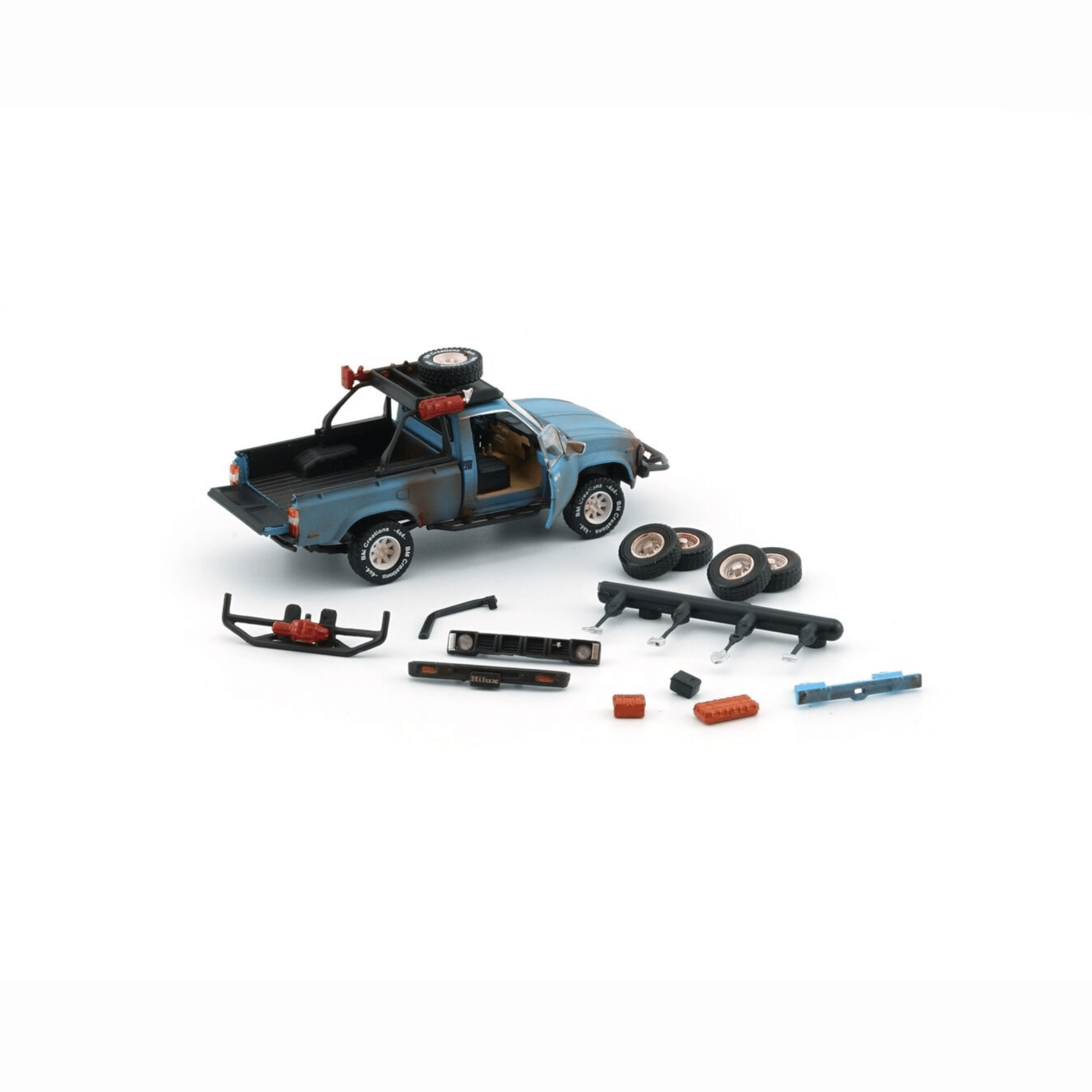 Toyota Hilux 1983 N60 N70 matte rusting blue LHD with accessory BM Creations 1/64 - BM64B0361Lhd